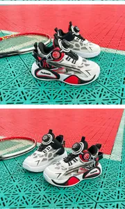 Detailed view of kids' breathable basketball shoes with dial closure on a sports court