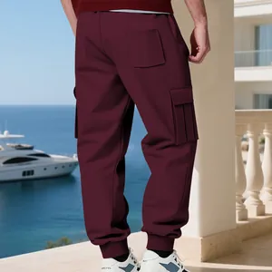 Back view of men's loose fit burgundy heavy fleece cargo sweatpants with multi-pockets