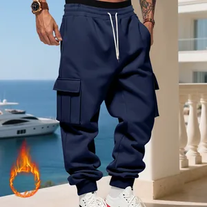 Detailed view of heavy fleece-lined navy blue cargo pants with side pockets for men.