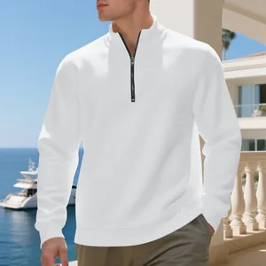 Men's premium white half-zip fleece sweatshirt shown in an elegant outdoor lifestyle setting