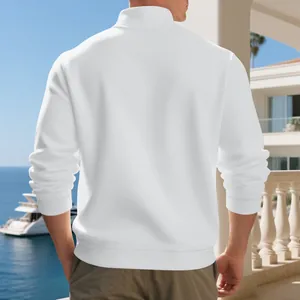 Detail back view of a white men's half-zip sweatshirt in a seaside balcony setting.