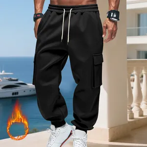 Detail shot of men's heavyweight black fleece-lined cargo sweatpants with multi-pocket design