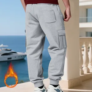 Men's heavy fleece cargo pants with multi-pockets for autumn and winter outdoor wear.