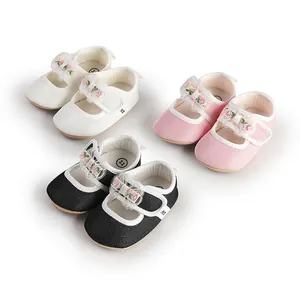 Adorable infant princess shoes with floral bow details in pink, white and black mesh fabric