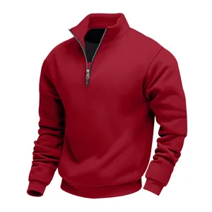 Detailed view of a men's red oversized half-zip fleece pullover sweatshirt.