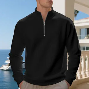 Men's casual black quarter-zip sweatshirt with warm fleece lining and ribbed cuffs
