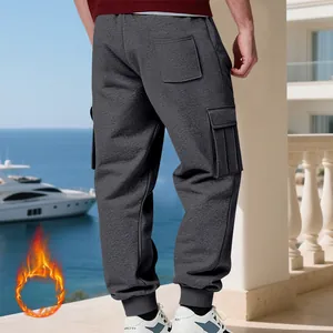 Detailed back view of heavy fleece-lined men's grey cargo pants featuring side pockets