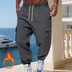 Detailed view of dark grey heavy fleece-lined cargo joggers for men with drawstring waist