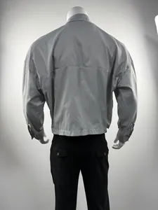 Detailed back view of a men's vertical striped long-sleeve loose shirt on a mannequin.