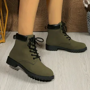 Trendy olive green lace-up Martin boots for women featuring a stylish British aesthetic