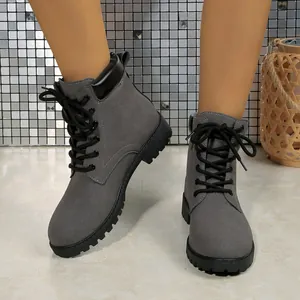 Stylish grey faux suede lace-up Martin boots for women, classic British style design.
