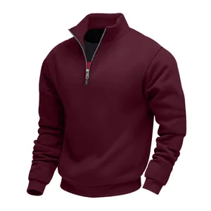 Detail of the silver half-zip collar on a men's burgundy fleece-lined sweatshirt