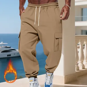 Detail view of khaki heavy fleece-lined men's cargo pants with multi-pockets