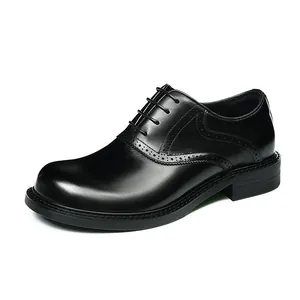 Classic black leather Derby shoes with elegant brogue detailing and a round toe