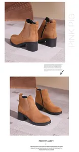 Vue détaillée de bottines en daim marron avec talons blocs et fermetures éclair