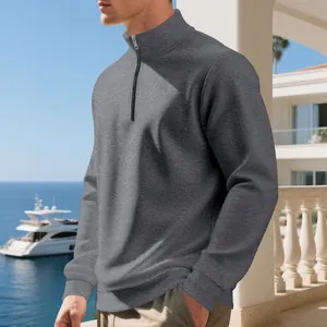 Detailed side view of grey men's half-zip casual sweatshirt featuring ribbed cuffs