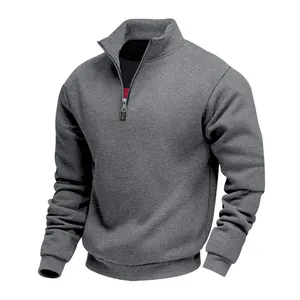 Detail view of men's grey half-zip fleece sweatshirt with ribbed cuffs and collar
