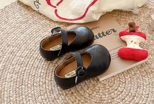 Schwarze Mary-Jane-Schuhe aus Leder für Mädchen mit runder Kappe und Schnallenriemen