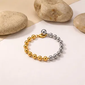 Minimalist two-tone gold and silver beaded bracelet with secure lobster clasp closure