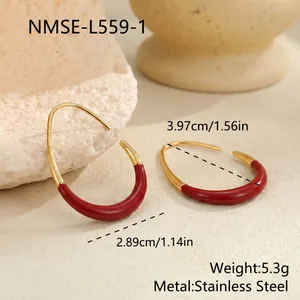 Detail of burgundy enamel gold-rimmed C-shaped earrings with measurements and weight specifications