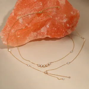 Elegant double-layered Y-shaped gold necklace with sparkling cubic zirconia accents