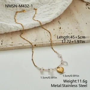Detail view of rose quartz heart pendant necklace with measurements in centimeters and inches.