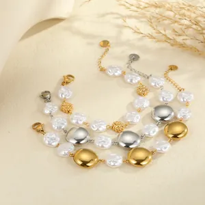 Elegant baroque pearl and metal disc bracelets in gold and silver finishes for women