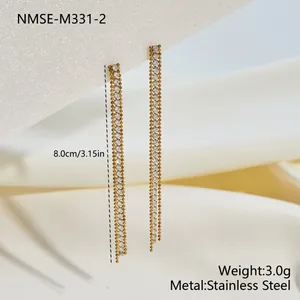 Detailed close-up view of long stainless steel tassel earrings with sparkling full zircon stones
