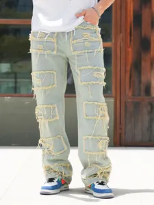 Detailansicht von lockeren Herrenjeans im Straight-Schnitt mit Patchwork-Design.