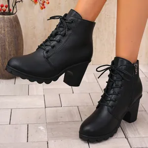 Elegant women's black lace-up chunky high heel ankle boots with a stylish round toe design