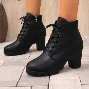 Chic black lace-up ankle boots with a sturdy block heel and round toe design