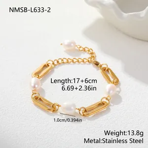 Detail view of gold plated stainless steel pearl bracelet with size and weight specs