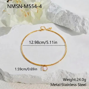 Detailed view of gold-plated stainless steel choker with single crystal and size