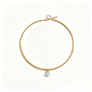Detailed close-up of a gold-plated stainless steel choker with a teardrop crystal