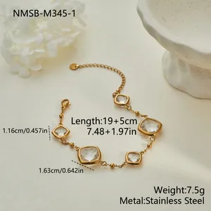 Elegant gold-plated stainless steel bracelet featuring square clear stones and size specs
