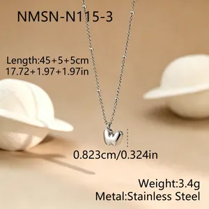 Detail view of silver bubble letter W necklace with measurements and steel material