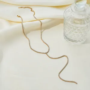 Elegant gold stainless steel Y-shaped necklace with shimmering cubic zirconia stones