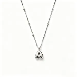 Close-up of silver bubble letter A pendant on a stainless steel bead chain necklace