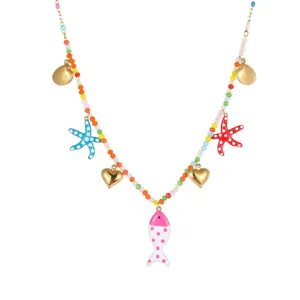 Detailed view of colorful beaded necklace with ocean fish, starfish, and heart charms