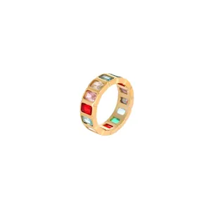 Close-up detail of a gold stainless steel ring with vibrant multi-colored rectangular stones