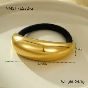 Detail view of a polished gold arc hair tie with dimensions 5.19cm and weight 24.1g
