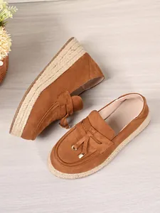 Brown suede platform espadrille loafers for women with tassel detail