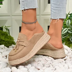 Women's chic beige platform espadrille loafers featuring tassel detail and easy slip-on style