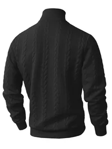 Rear view of black cable knit turtleneck sweater showing thick texture