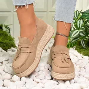 Stylish women's khaki suede platform espadrille loafers with tassel detail on stones