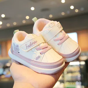 Cute white and pink toddler walking shoes with soft soles for babies aged 1-3 years