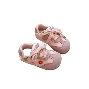 Pink children's German training sneakers with cute flower embroidery and soft soles