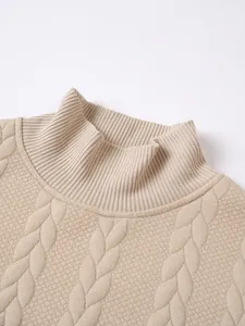 Close-up detail of beige cable knit turtleneck sweater with ribbed collar for men