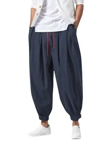 Pantalón de algodón y lino azul marino con cordón rojo y cintura elástica cómoda.