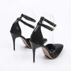 Back view of elegant black pointed-toe stiletto pumps with double ankle straps and buckles